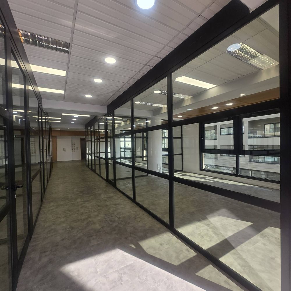 Clean glass partitions in a modern office